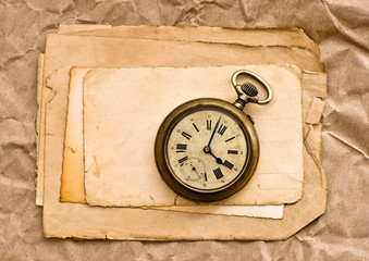 Old paper sheets vintage pocket clock
