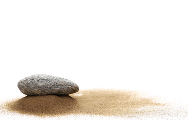 Sea stone in sand pile isolated on white background
