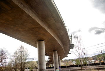 Under a Curved Train Bridge