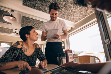 Woman ordering at a restaurant