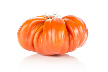 Beef tomato isolated on white background one big red ribbing.