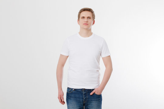 Front view. Young man wearing blank white t-shirt isolated on white background. Copy space. Place for advertisement. Mock up. Summer shirt.