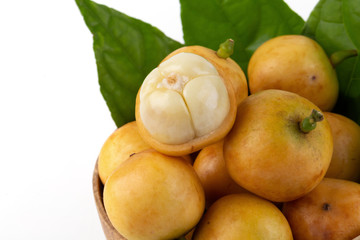 Rambeh tropical fruit with leaf isolated on white background