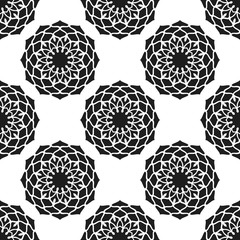 Seamless pattern with abstract flowers. Fashion textile print. Asian fabric background. Vector monochrome design. Perforation floral holes.