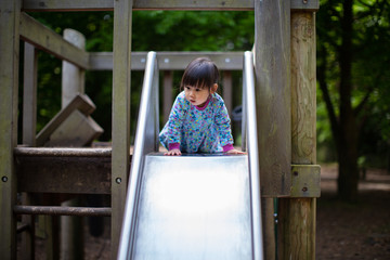 baby girl play at spring forest park