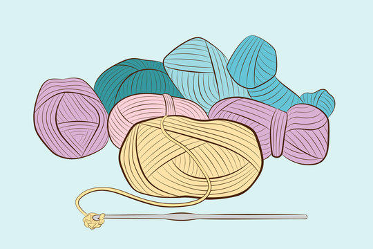 Skeins of yarn with crochet hook isolated on blue background