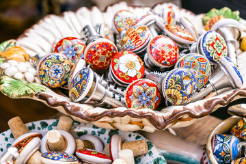 exhibition of the typical ceramics make a hand and detail of decorated caps for bottles in a shop in Palermo, Sicily island