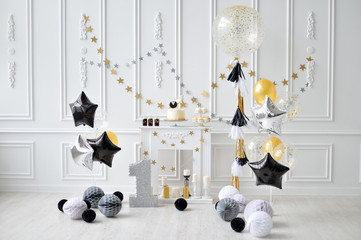 Decorations for holiday party. A lot of balloons black and white colors. Balloons stars. 