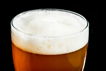 beer in a glass, crafted wheat chef beer with foam