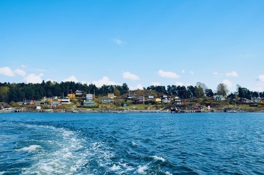 house docks in Oslo's fiord for sailing boats nature trees