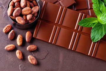 chocolate and cocoa on dark background