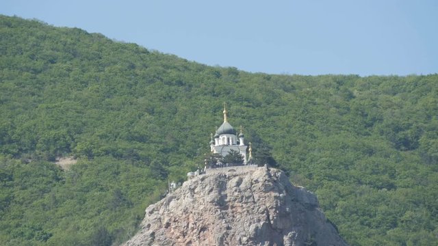 View on a beautiful Foros Orthodox Church, which stands on top among the rocky and green Crimean mountains