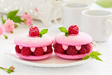French makarons cake with raspberries.