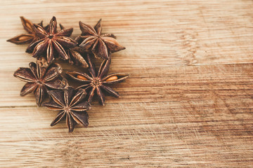 Close up of star anise on wooden board