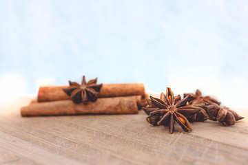 cinnamon and star anise on a wooden board