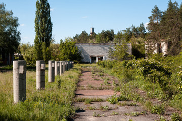 Fototapeta na wymiar Abandoned buildings of old soviet pioneer camp