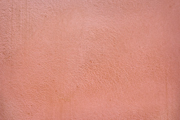 Pastel pink ( salmon ) slate, stone or concrete background.