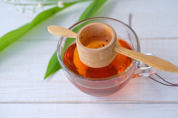 Chinese tea Shen Puer and Lily of the valley