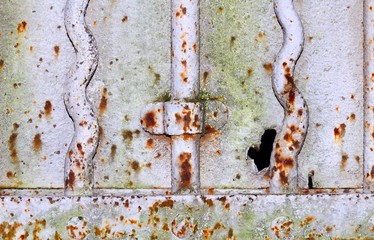 Very old and rusty iron gate detail. Useful for texture or background.