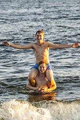 Fototapeta premium people enjoy the beautiful beach in late afternoon at Dauphin Islands