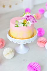 Cake for birthday party. Decorations for holiday party. A lot of balloons. 