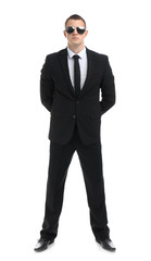 Male security guard in uniform on white background