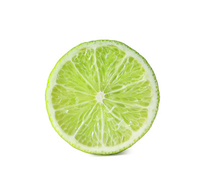 Half of fresh ripe lime on white background
