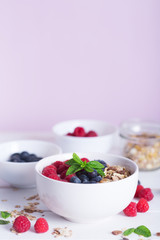 Smoothie bowl with yogurt, fresh berries and cereal. Superfood
