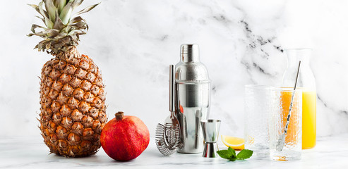 preparation of a drink, a cocktail on a marble table. all the ne