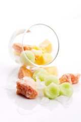 frozen exotic fruits on white background