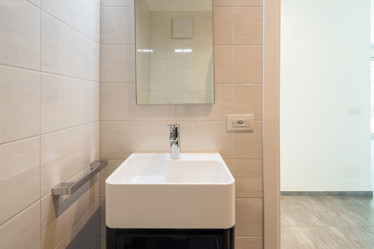 Minimalist modern bathroom with large tiles
