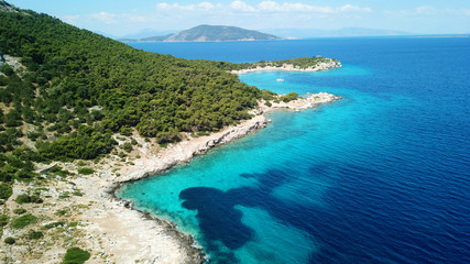 Fototapeta na wymiar Aerial drone bird's eye photo of tropical paradise island beach with emerald crystal clear waters