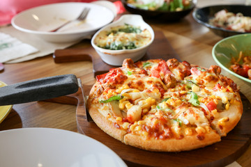 Seafood pizza pan on the table