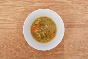 Miso vegetable soup with vegetables on a table