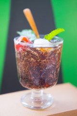 Soft drink with cherry and mint
