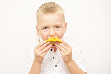 boy and a ripe mango