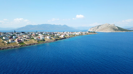 Aerial drone bird's eye view photo of port and traditional fishing village of Perdika in island of Aigina, Saronic Gulf, Greece