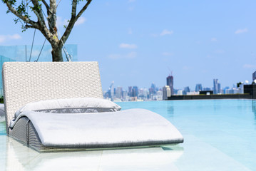 Relaxing or Leisure bed in swimming pool with blue sky
