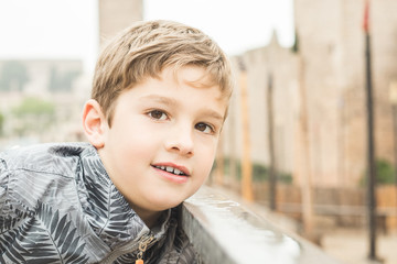 Portrait of a smiling blond child