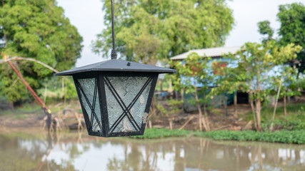Close up lamp and river.
