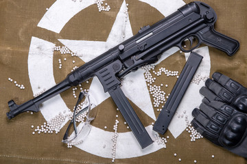 air soft gun with protective glasses and lot of bullets