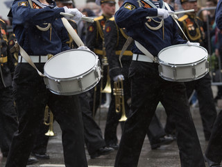 Navy orchestra participate in parade.