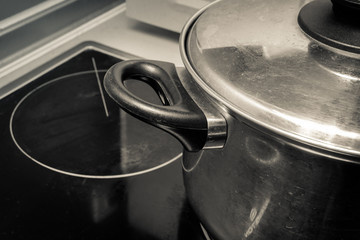 Iron pan on the stove for soup