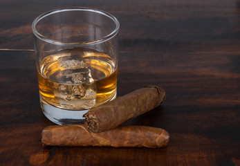 whisky on the rock on wood and wood background