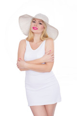 Beautiful young blond woman in a hat. Studio. Isolate. Concept - summer mood