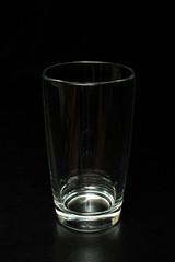 Empty glass on a black background