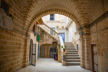 View of a narrow sunny street in the city Bari © dtatiana