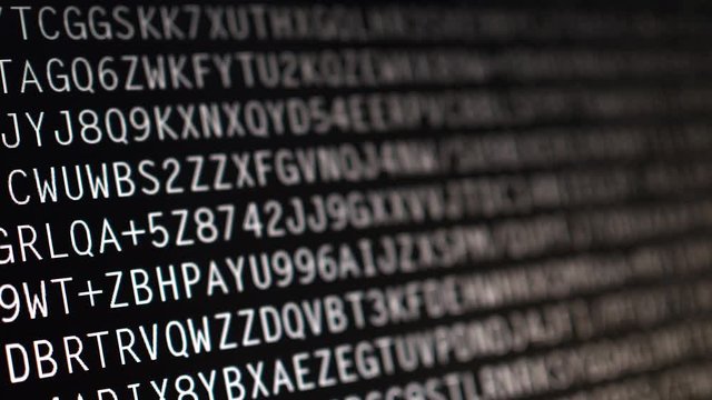 Computer hacking in process, texts running and flowing on screen