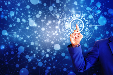 Businessman on blurred background using flying earth network interface, Businessman touching global network