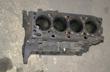 Disassembled diesel engine for repair. Cylinder block.